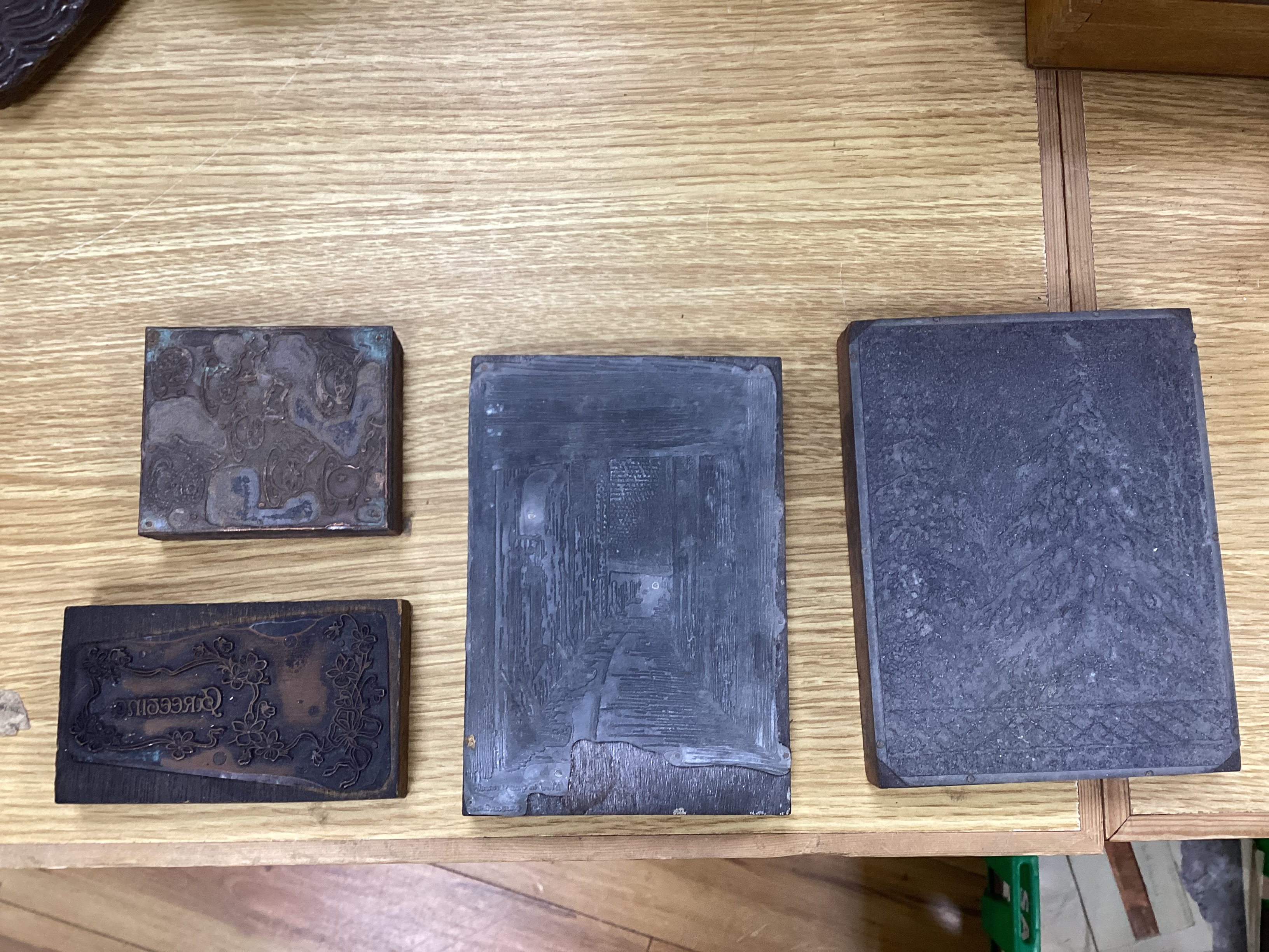 A collection of decorative metal printing blocks, mainly 20th century examples